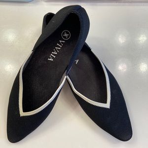Black & white point toe vivaia shoes.